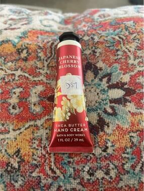 D59  1 Bath and Body Works hand cream 1 oz Japanese cherry blossom